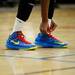 A Pioneer basketball player ties his shoes in the first quarter on Friday, Feb. 1. Daniel Brenner I AnnArbor.com